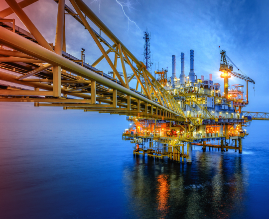 An offshore rig at night